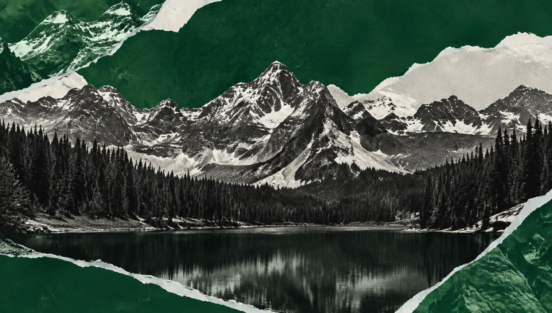 Alpine lake beneath snowy peaks